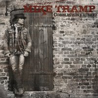 Caught in the Storm - Mike Tramp